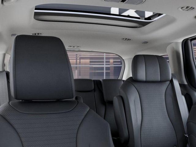 Photo of 2026 Snow White Pearl Kia Carnival Hybrid