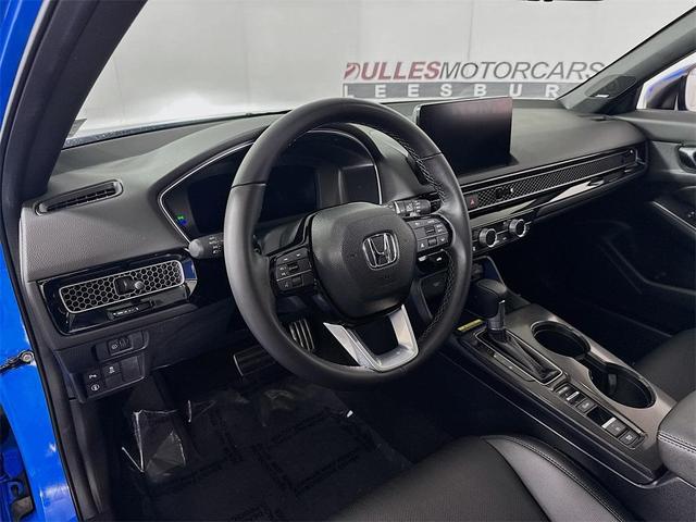 Photo of 2024 Boost Blue Pearl Honda Civic
