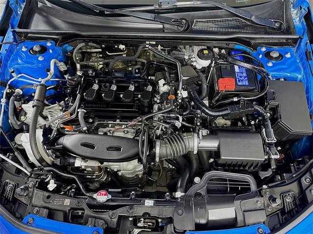 Photo of 2024 Boost Blue Pearl Honda Civic