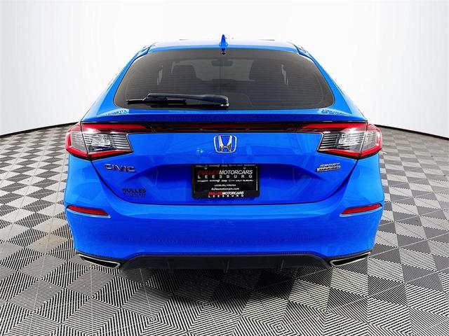 Photo of 2024 Boost Blue Pearl Honda Civic