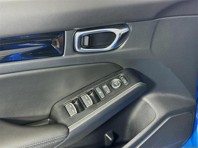 Photo of 2024 Boost Blue Pearl Honda Civic