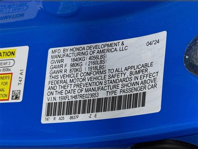 Photo of 2024 Boost Blue Pearl Honda Civic