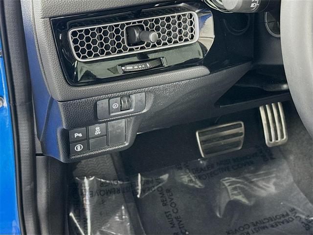Photo of 2024 Boost Blue Pearl Honda Civic