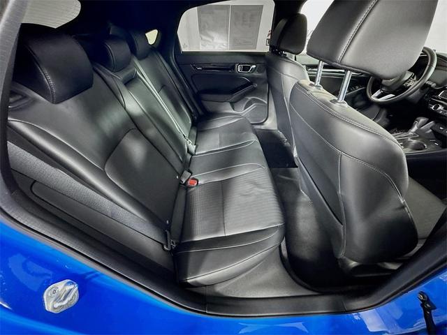 Photo of 2024 Boost Blue Pearl Honda Civic