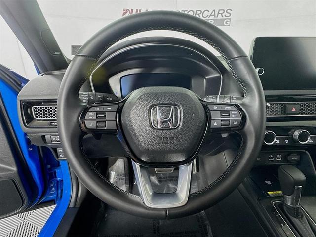 Photo of 2024 Boost Blue Pearl Honda Civic