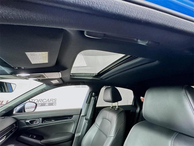 Photo of 2024 Boost Blue Pearl Honda Civic