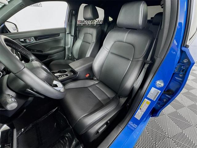 Photo of 2024 Boost Blue Pearl Honda Civic