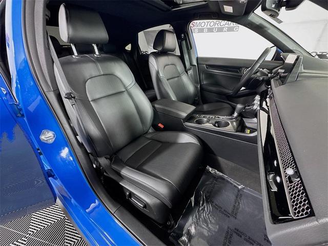 Photo of 2024 Boost Blue Pearl Honda Civic