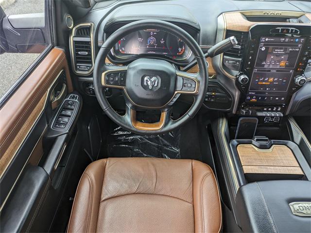Photo of 2024 Diamond Black Crystal Pearlcoat RAM 2500