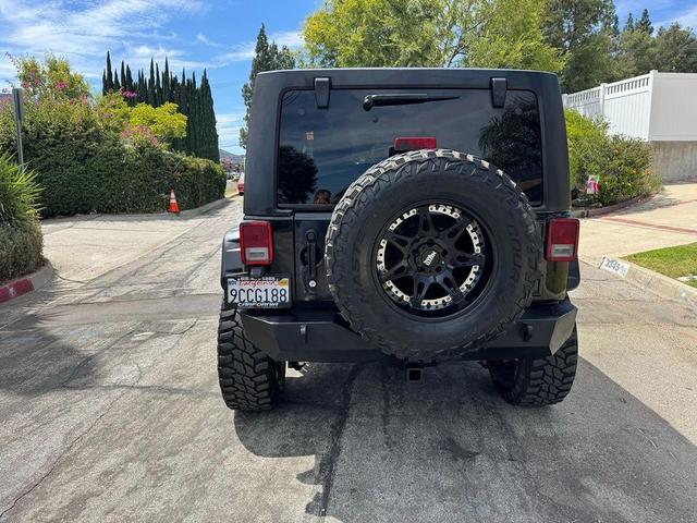 Photo of 2015 Black Clearcoat Jeep Wrangler Unlimited