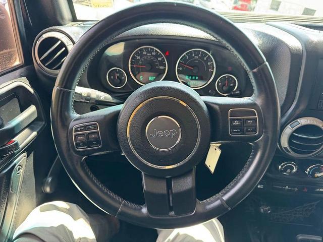 Photo of 2015 Black Clearcoat Jeep Wrangler Unlimited