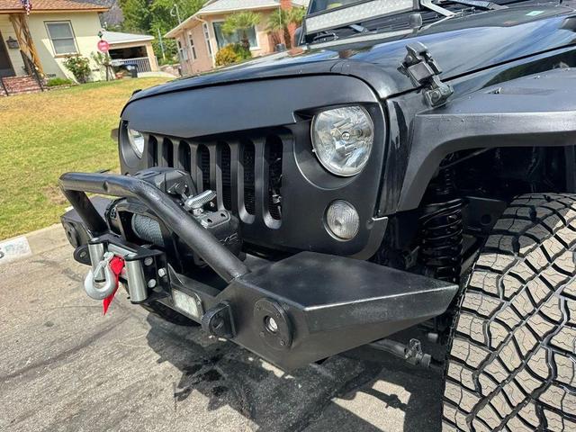 Photo of 2015 Black Clearcoat Jeep Wrangler Unlimited