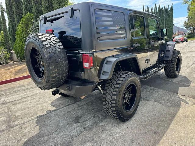 Photo of 2015 Black Clearcoat Jeep Wrangler Unlimited