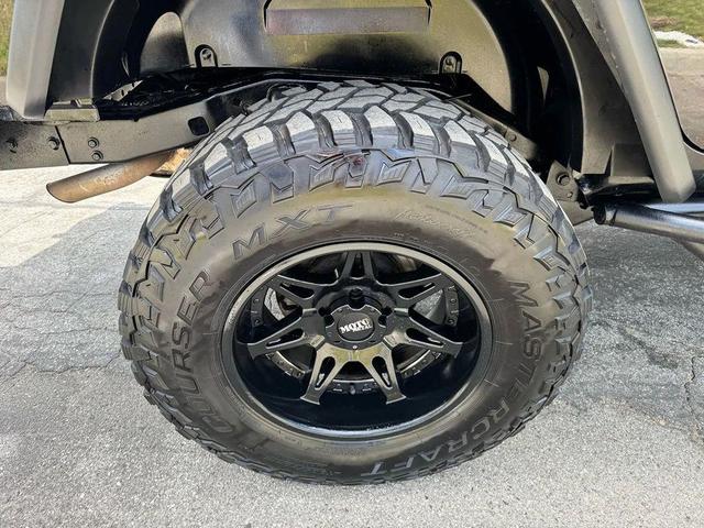 Photo of 2015 Black Clearcoat Jeep Wrangler Unlimited