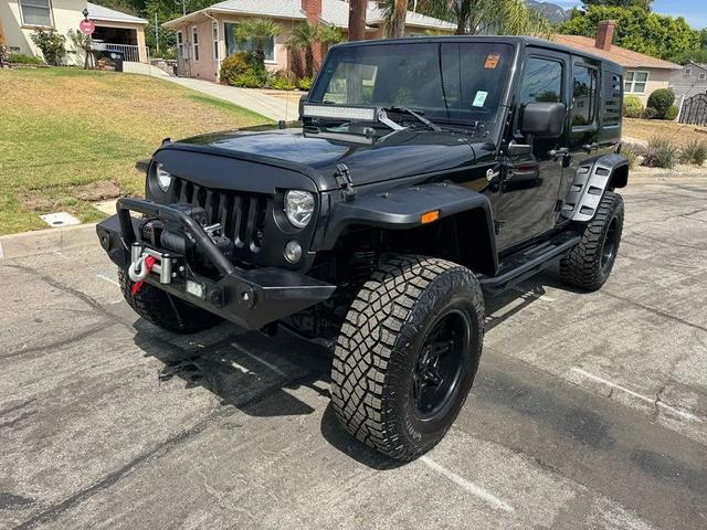 Photo of 2015 Black Clearcoat Jeep Wrangler Unlimited