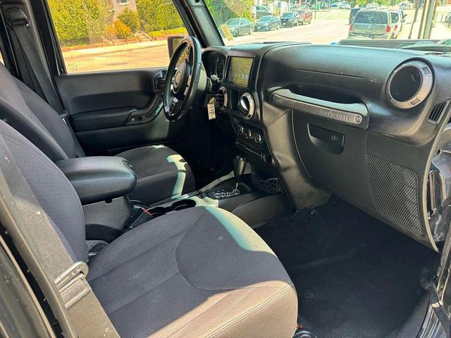 Photo of 2015 Black Clearcoat Jeep Wrangler Unlimited