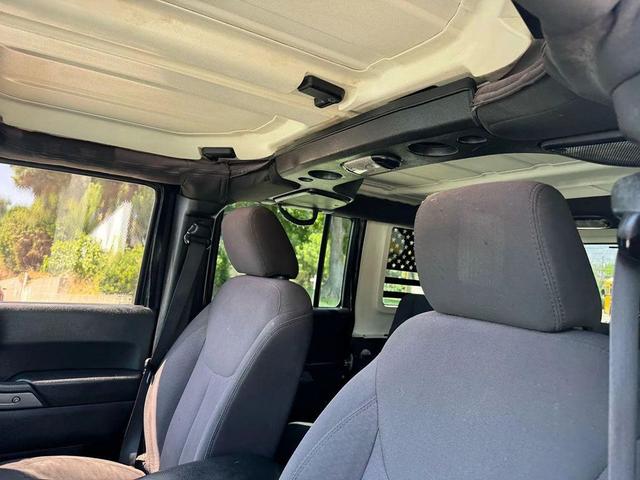 Photo of 2015 Black Clearcoat Jeep Wrangler Unlimited