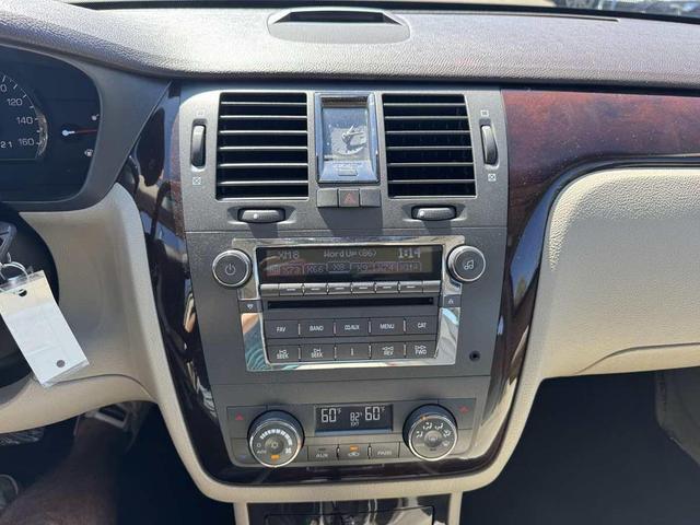 Photo of 2009 Blue Diamond Tricoat Cadillac DTS