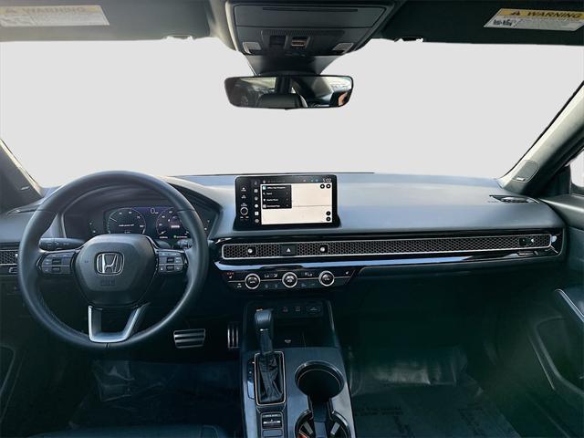 Photo of 2025 Crystal Black Pearl Honda Civic Hybrid