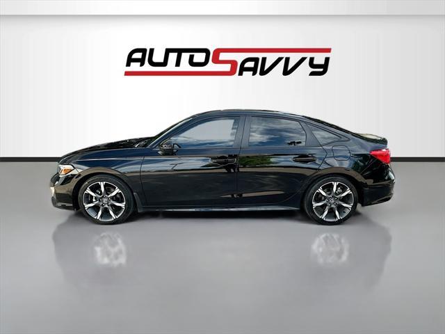 Photo of 2025 Crystal Black Pearl Honda Civic Hybrid