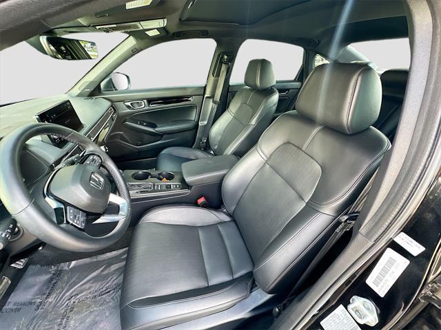 Photo of 2025 Crystal Black Pearl Honda Civic Hybrid
