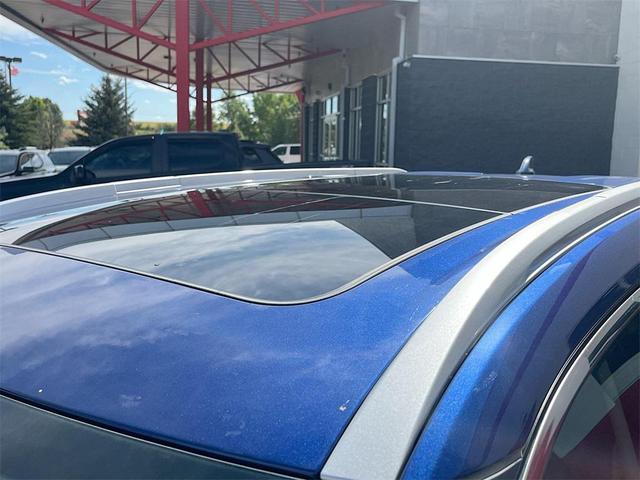 Photo of 2022 Caspian Blue Metallic Nissan Rogue