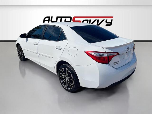Photo of 2016 Super White Toyota Corolla