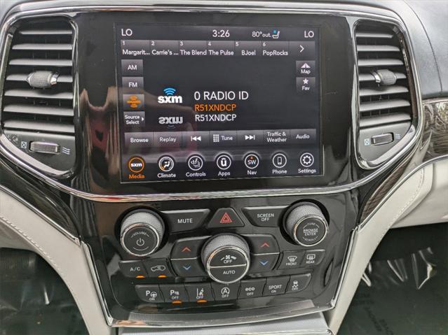 Photo of 2021 Ivory 3-Coat Jeep Grand Cherokee