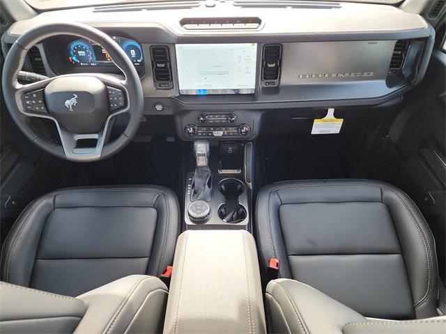 Photo of 2025 Azure Gray Metallic Tri-Coat Ford Bronco
