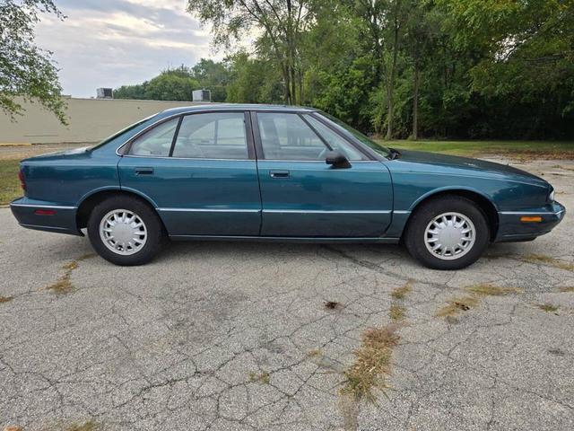 Photo of 1997 Medium Dark Teal Metallic Oldsmobile Eighty-Eight