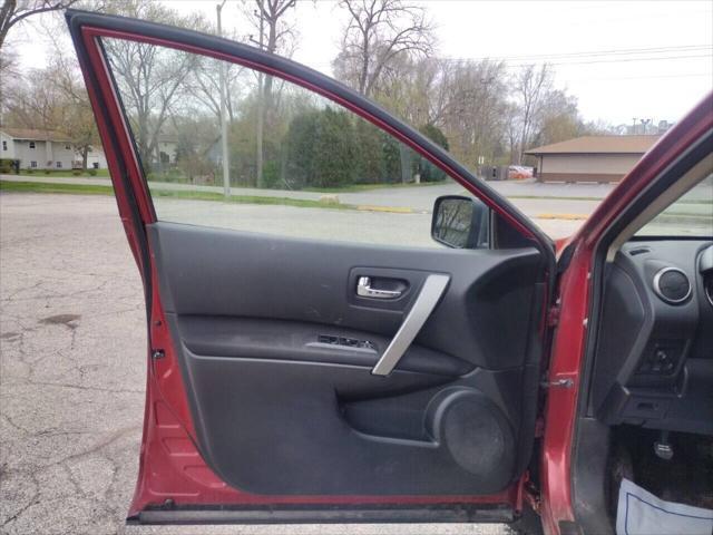 Photo of 2011 Cayenne Red Nissan Rogue