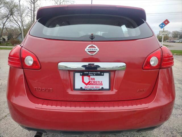 Photo of 2011 Cayenne Red Nissan Rogue