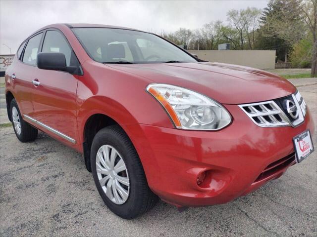 Photo of 2011 Cayenne Red Nissan Rogue