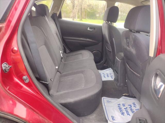 Photo of 2011 Cayenne Red Nissan Rogue