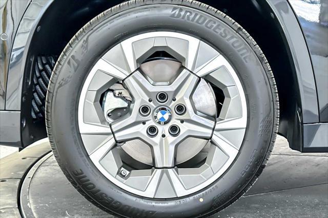 Photo of 2025 Black Sapphire Metallic BMW X1