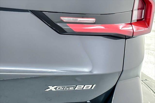 Photo of 2025 Black Sapphire Metallic BMW X1