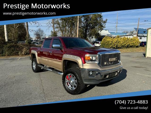 Photo of 2015 Burgundy GMC Sierra 1500