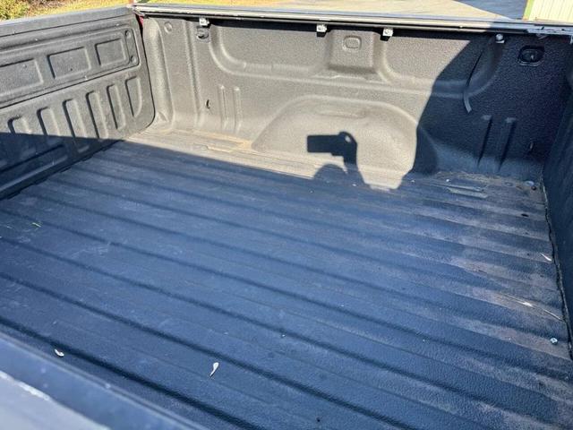 Photo of 2015 Burgundy GMC Sierra 1500