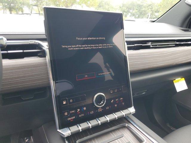 Photo of 2025 Summit White GMC Sierra EV