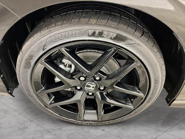 Photo of 2026 Crystal Black Pearl Honda Civic Hybrid