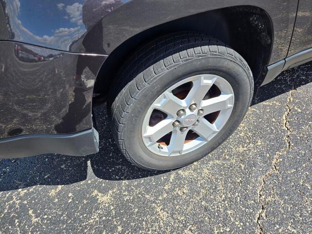 Photo of 2015 Iridium Metallic GMC Acadia
