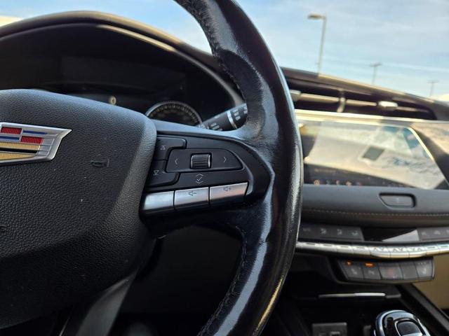 Photo of 2021 Stellar Black Metallic Cadillac XT4