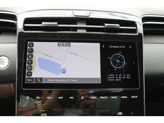 Photo of 2024 White Pearl Hyundai TUCSON Hybrid