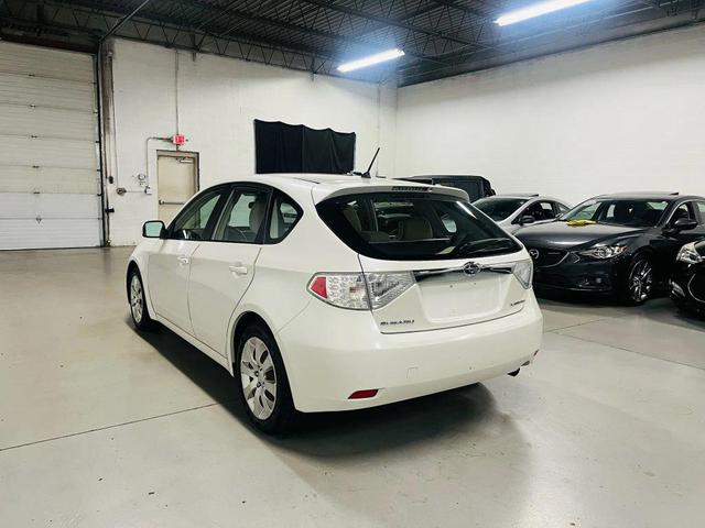 Photo of 2009 White Subaru Impreza
