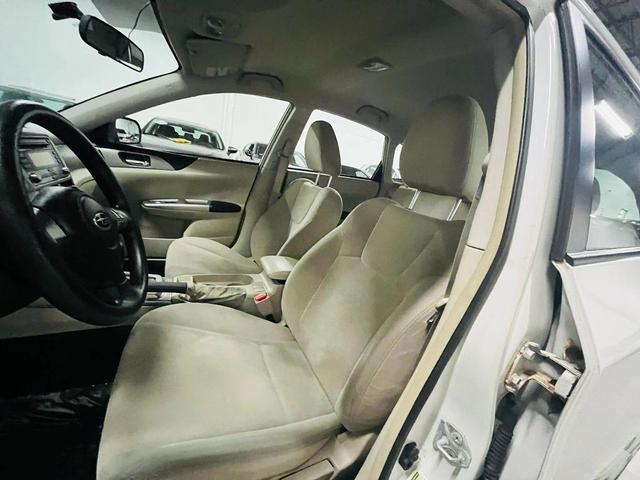 Photo of 2009 White Subaru Impreza
