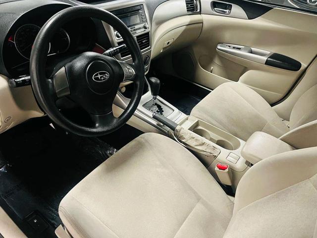 Photo of 2009 White Subaru Impreza