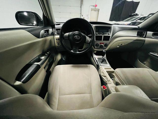 Photo of 2009 White Subaru Impreza