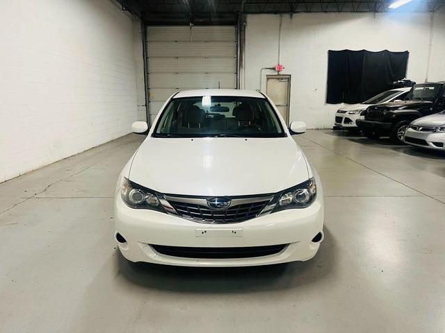 Photo of 2009 White Subaru Impreza