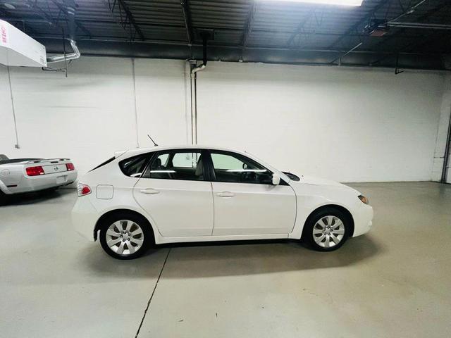Photo of 2009 White Subaru Impreza