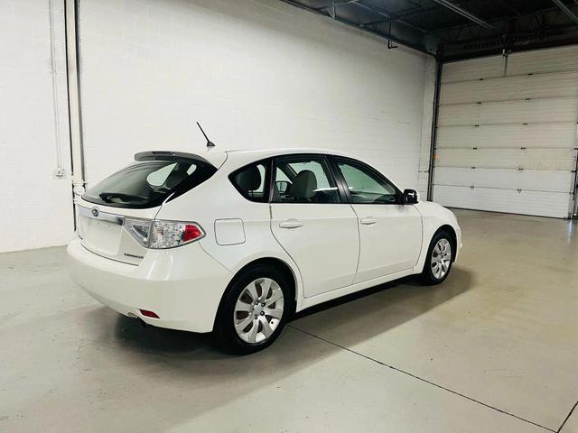 Photo of 2009 White Subaru Impreza